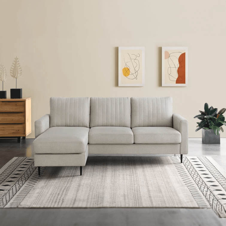 Lounger sofa, crafted with a high-heeled base for contemporary appeal. White lounger sofa. 