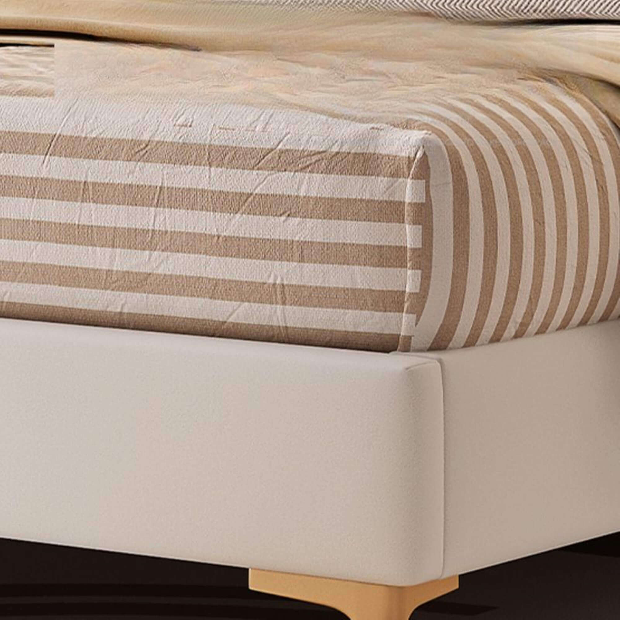 Queen size bed with a simple, elegant bed with cot aesthetic. upholstered bed striped