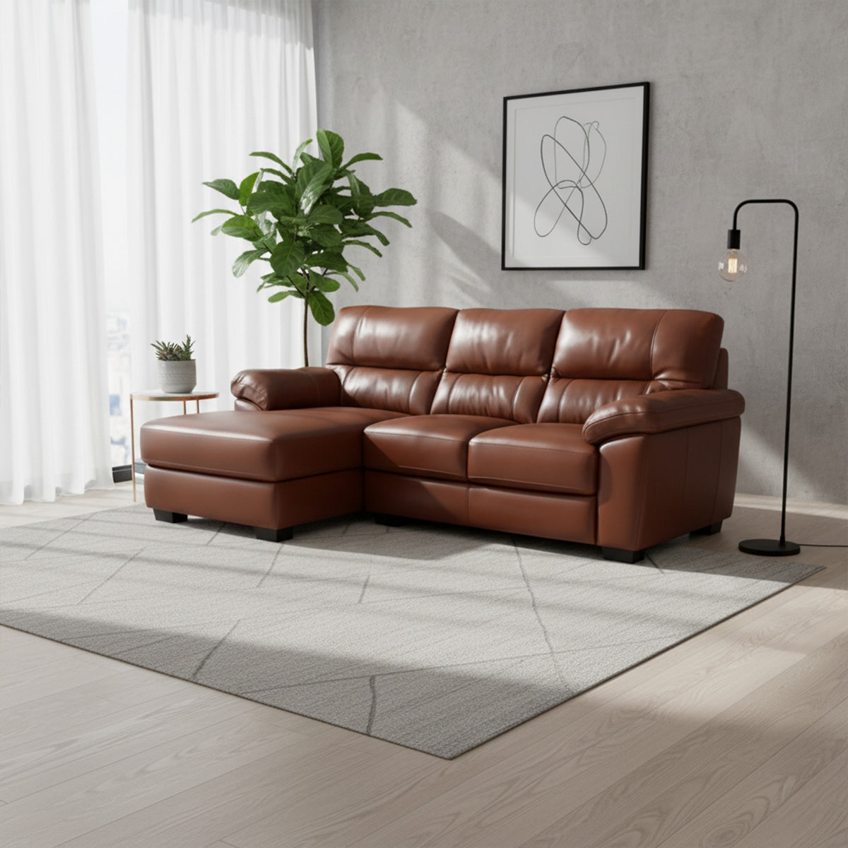 A brown leather 2-seater sofa with a right-hand side (RHS) chaise lounge in a bright, minimalist room with a gray wall and large windows. The sofa is placed on a light gray patterned rug.