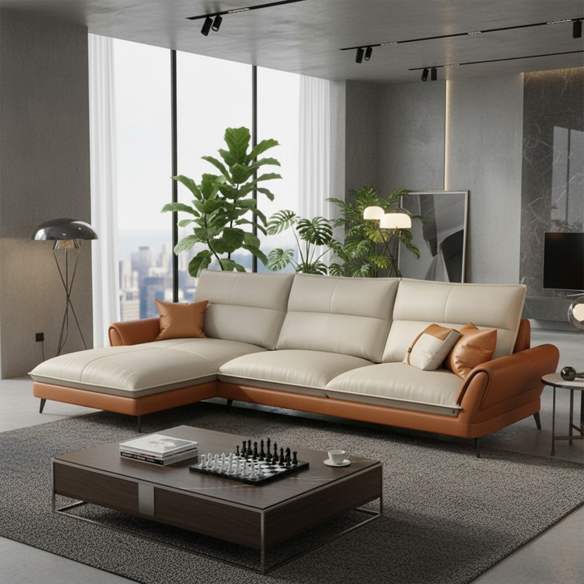 A contemporary NOVA sectional sofa featuring a two-seater section and a right-hand facing chaise lounge (RHS). It has tan leather sides and a cream seat and back. The sofa is set in a modern living room with large windows overlooking a city skyline and dark gray walls. A dark wood coffee table with a chess set sits on a gray rug.