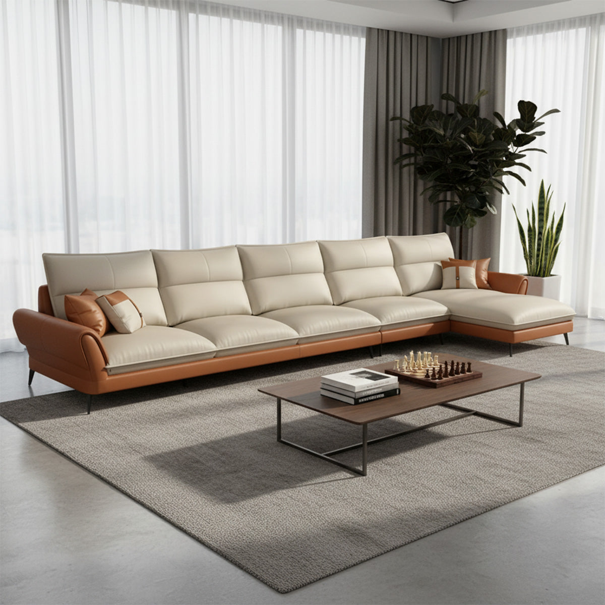 A very large NOVA sectional sofa configuration, appearing to be a four-seater section with a left-hand facing chaise lounge (LHS). The sofa is defined by its tan leather base and cream quilted cushions. It is situated in a bright room with floor-to-ceiling windows and sheer white curtains, centered on a light gray area rug.